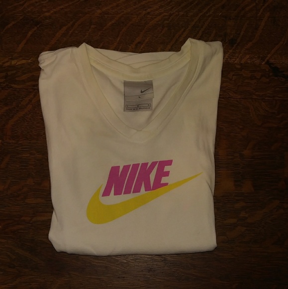 yellow and pink nike shirt